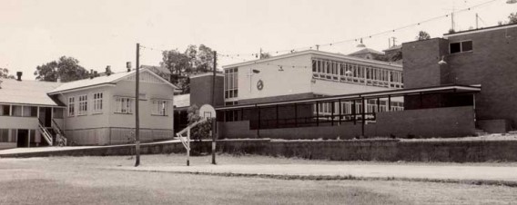 Archival photograph of early school buildings.